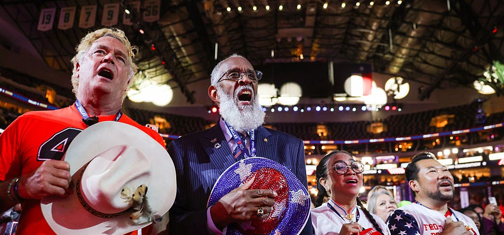 People stand for the national anthem on the second day of the 2026 Republican National Convention.